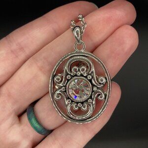 Light-Catching Pendant with Large Faux Gem and Silver Tone Scrollwork - Signed